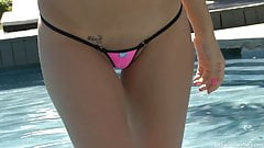 Stunning girl in pink micro bikini Vanessa